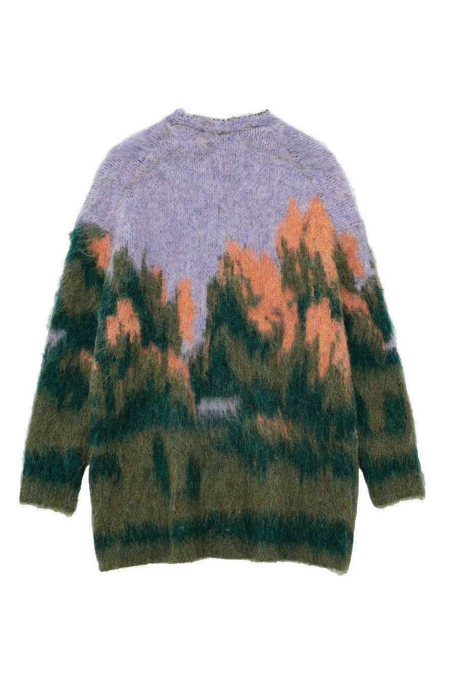 Multi - Woman wearing an oversized, fluffy knit cardigan featuring an abstract landscape pattern in shades of green, purple, and orange over a black turtleneck.