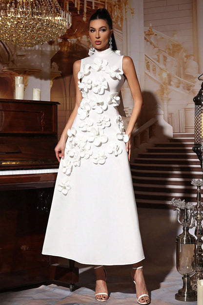 Woman in pink crepe gown with 3D floral appliques