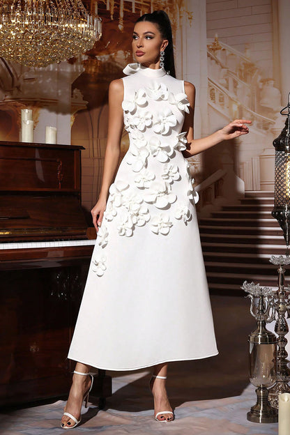 Woman in pink crepe gown with 3D floral appliques