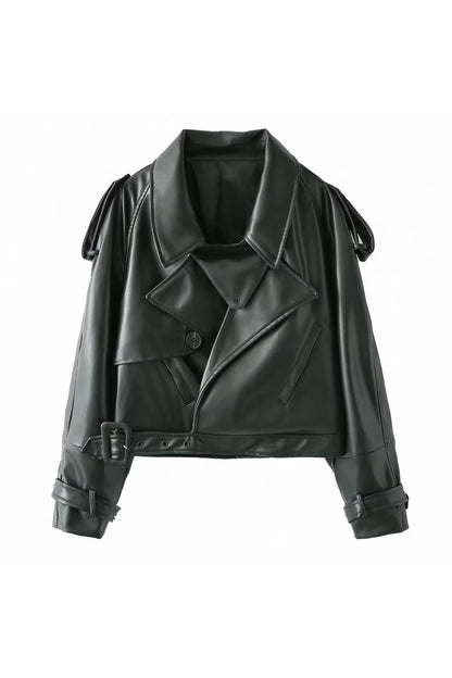 Dark Green - Woman wearing an oversized burgundy faux leather moto jacket with exaggerated shoulders, wide collar, and belted cuffs, styled in a chic city setting.