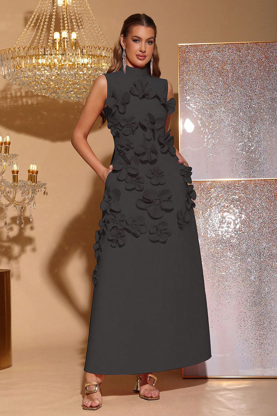 Woman in pink crepe gown with 3D floral appliques