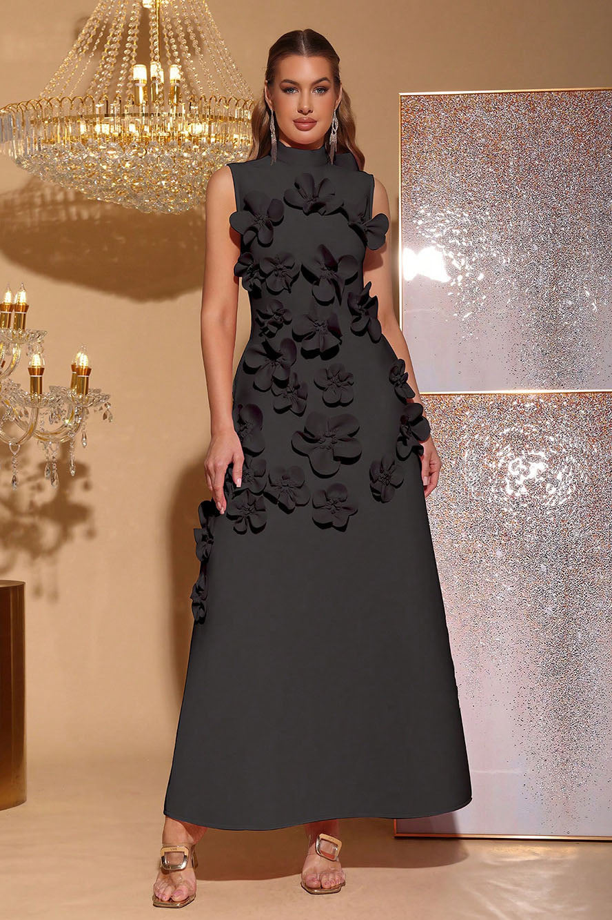 Woman in pink crepe gown with 3D floral appliques