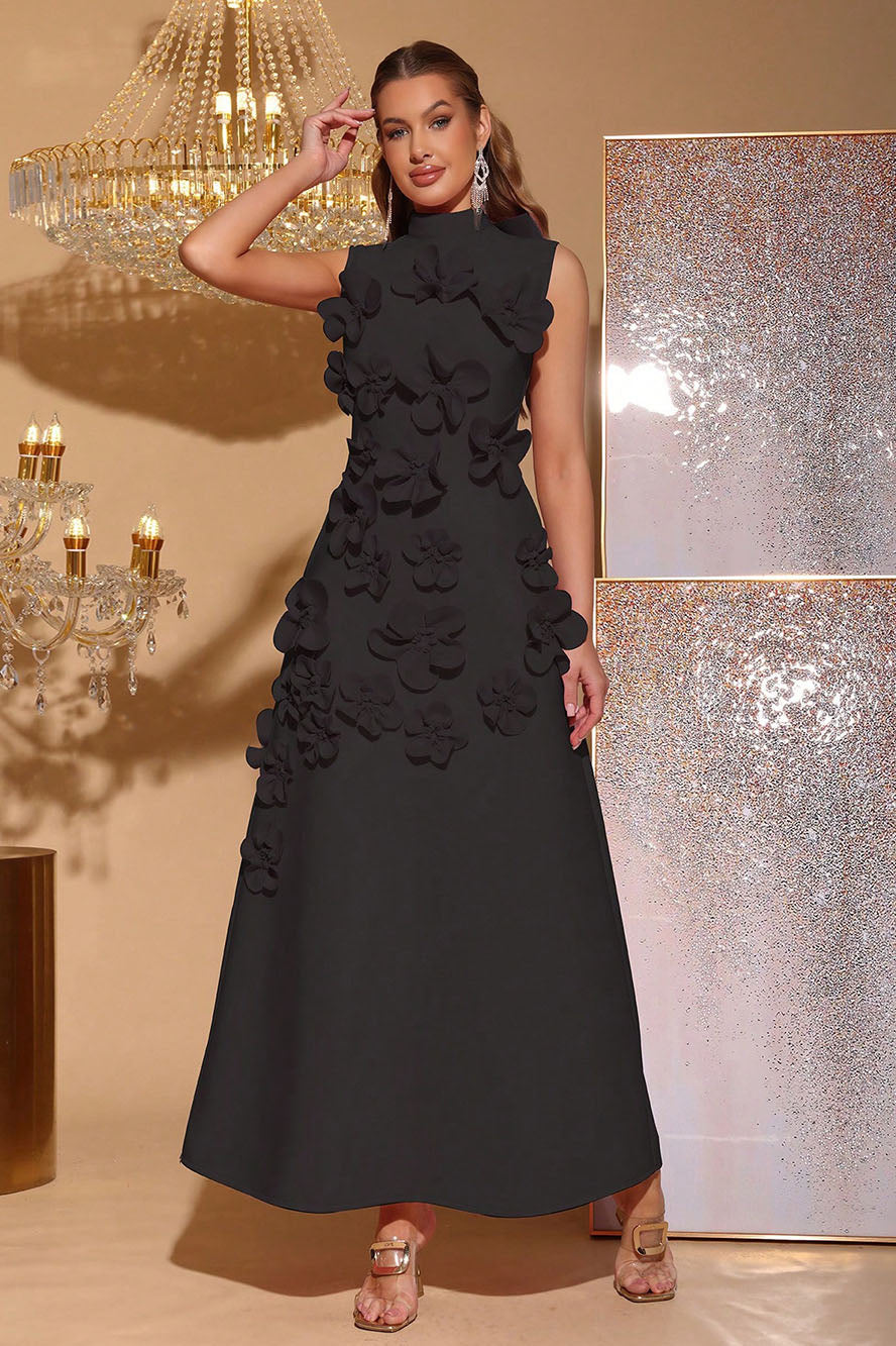 Woman in pink crepe gown with 3D floral appliques