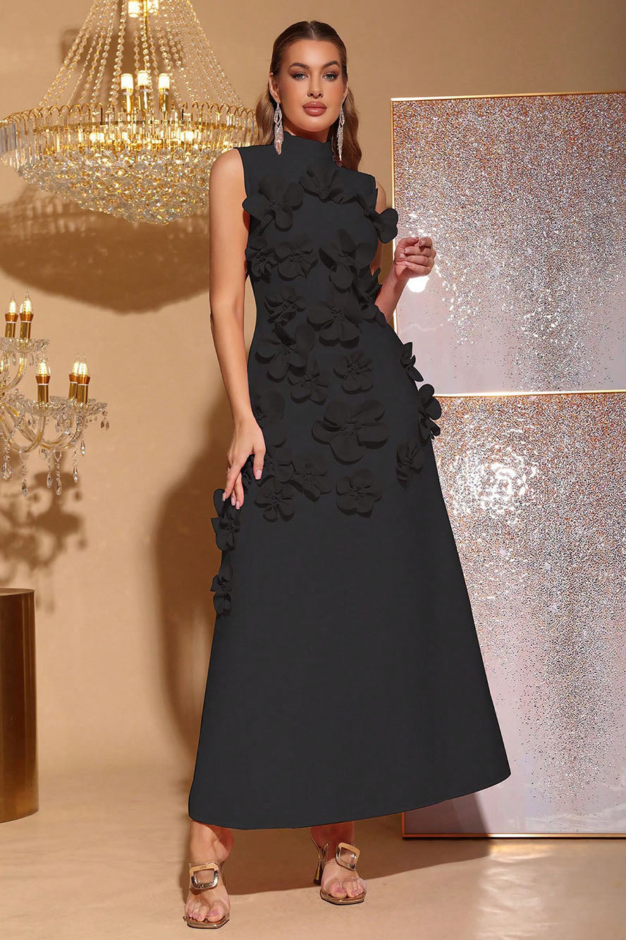 Woman in pink crepe gown with 3D floral appliques