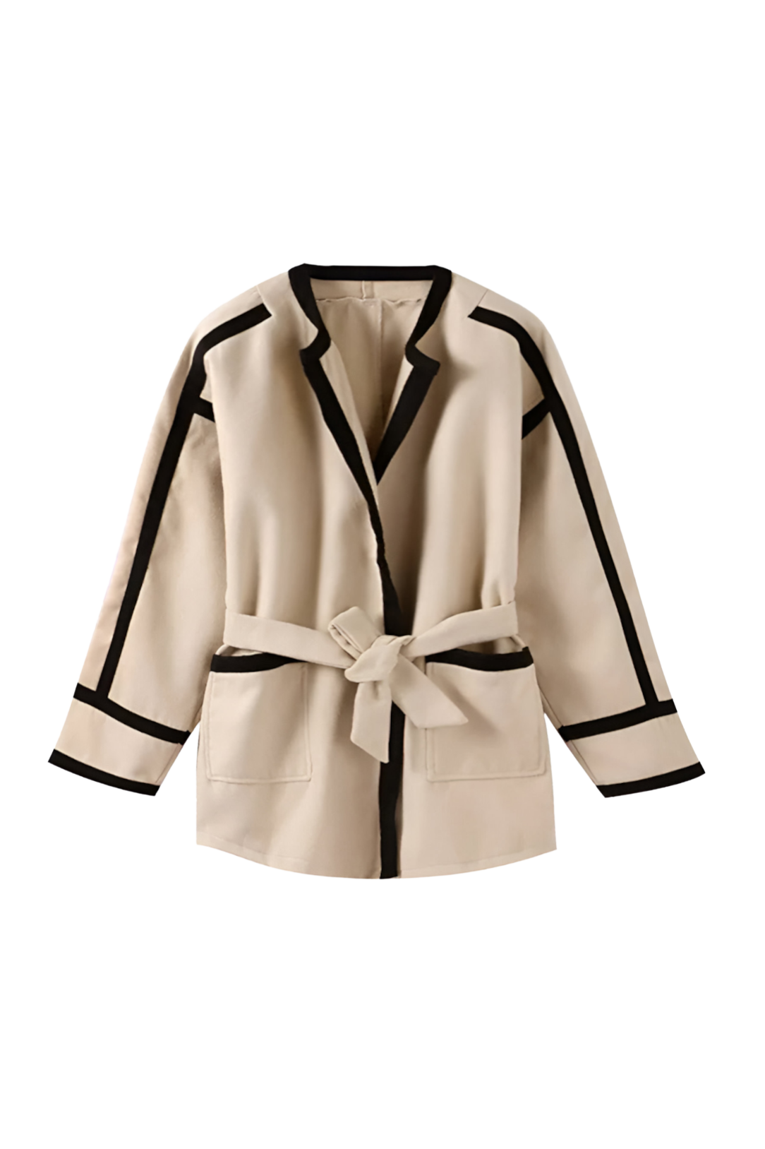 Khaki - A woman wearing a tan collarless wrap jacket with bold black contrast trim and a self-tie belt, layered over a blue striped shirt and jeans.