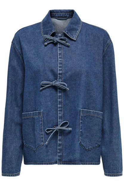 Blue - A woman taking a mirror selfie wearing a blue denim jacket featuring three tie-front closures and patch pockets, paired with wide-leg denim trousers.
