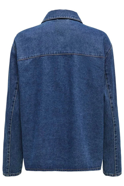Blue - A woman taking a mirror selfie wearing a blue denim jacket featuring three tie-front closures and patch pockets, paired with wide-leg denim trousers.