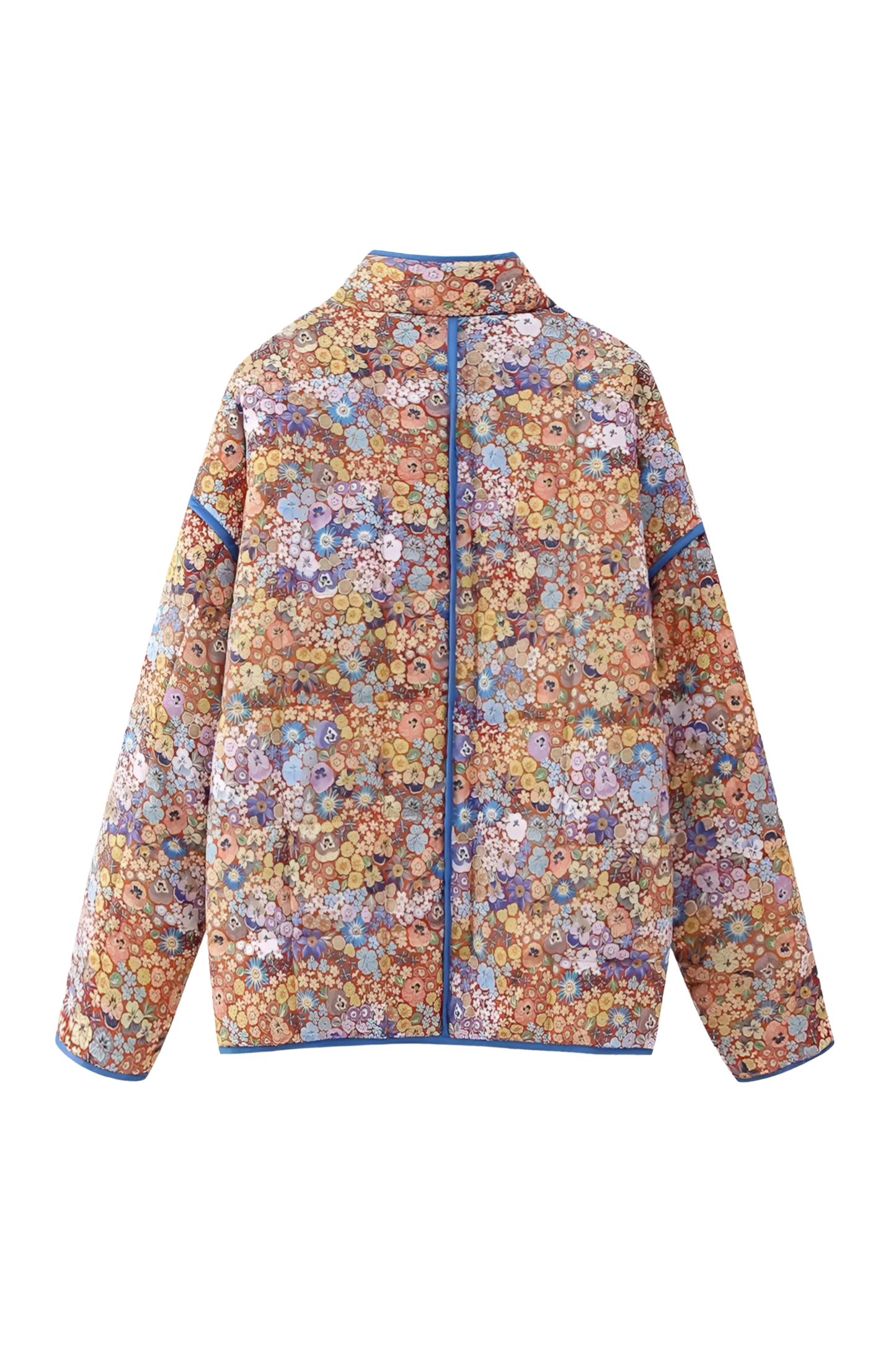 Women's relaxed-fit quilted jacket featuring a vibrant floral print, contrast blue binding on the edges and cuffs, and front patch pockets, worn open.