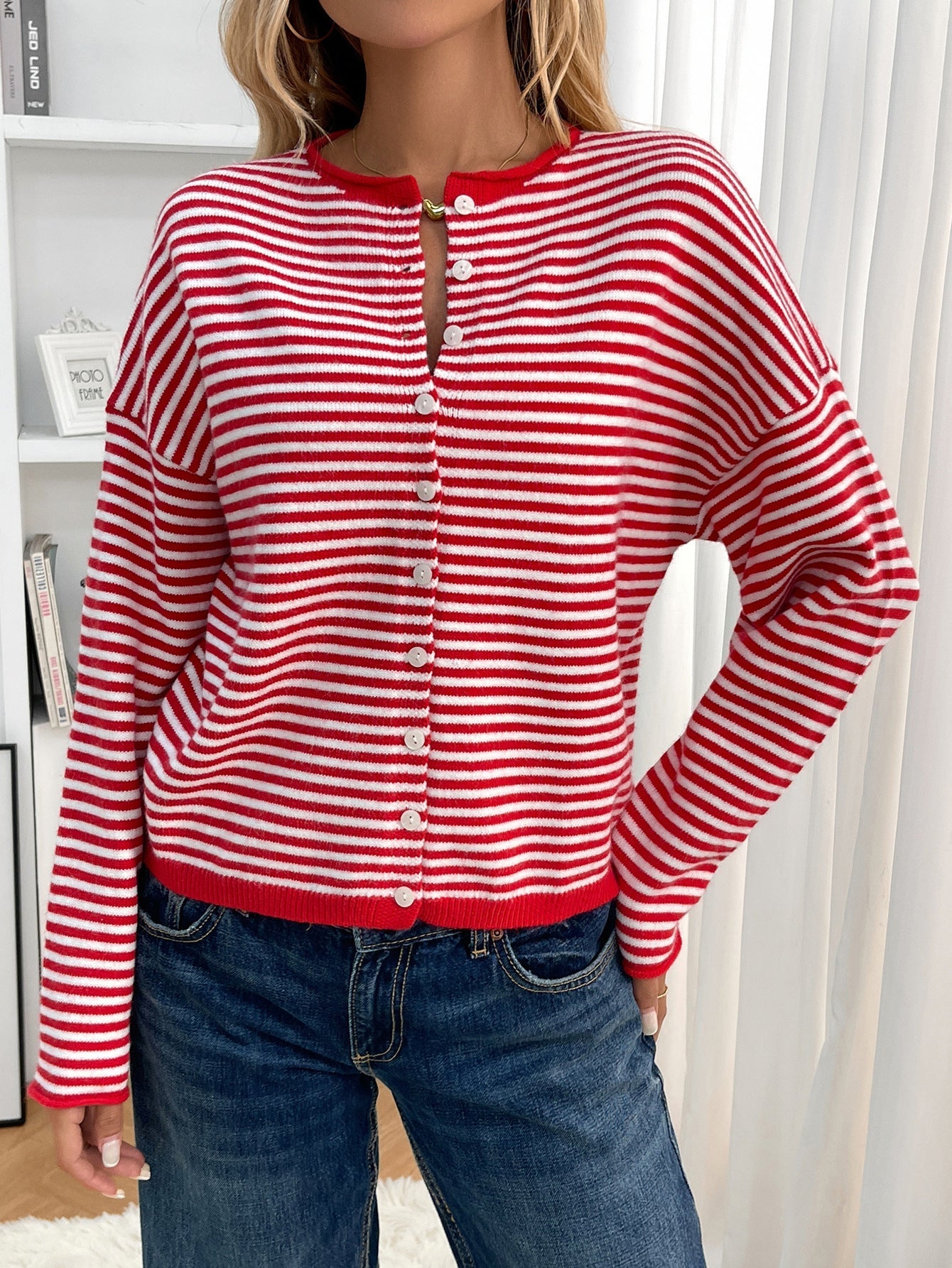 Red - Women's smart casual knit cardigan featuring red and white horizontal stripes, a button-front closure, and a relaxed fit, styled with blue jeans.