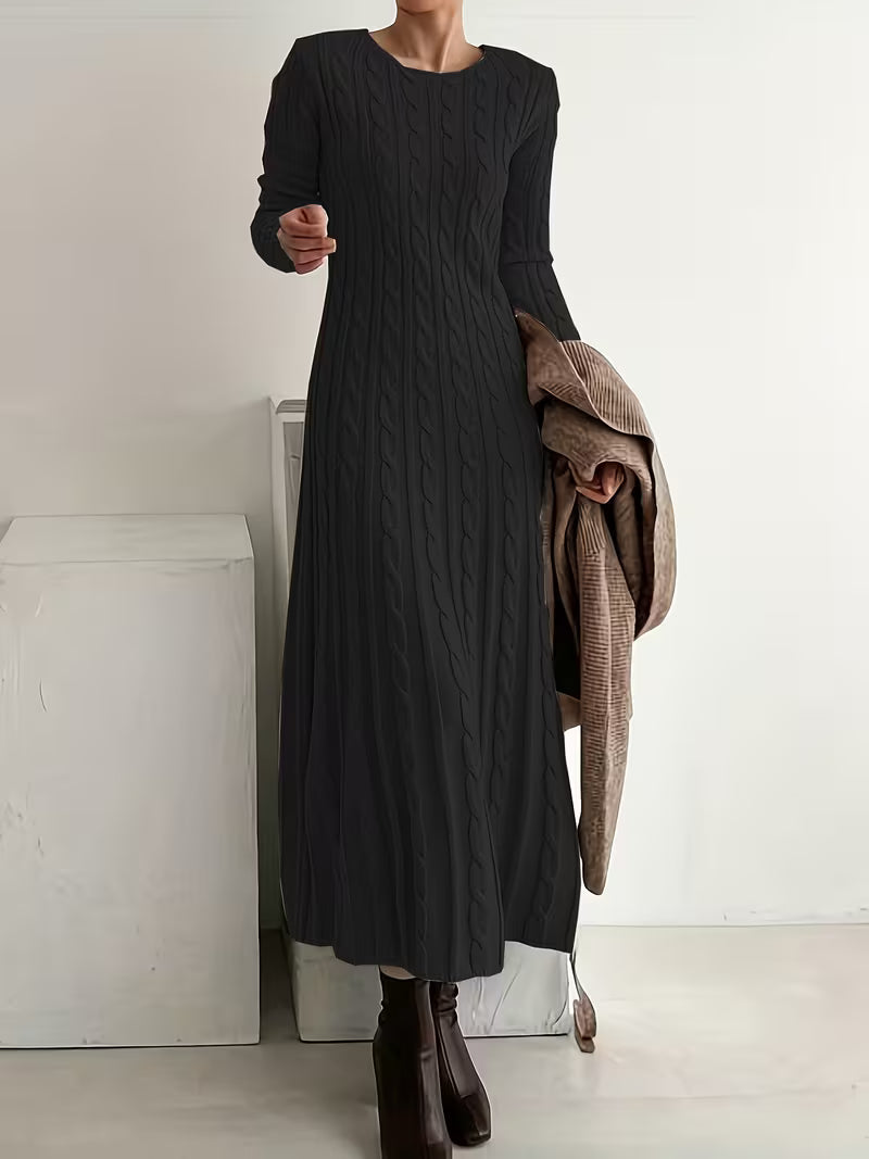 Black - Woman wearing a heavyweight long sleeve cable knit maxi dress with an A-line silhouette