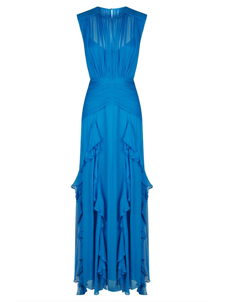 Blue - A woman wearing a vibrant cobalt blue sleeveless chiffon maxi dress featuring a high gathered neckline, a wide ruched waistband, and cascading vertical ruffles along the skirt.