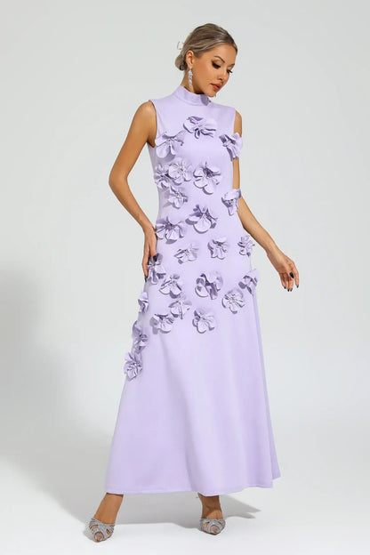 Woman in pink crepe gown with 3D floral appliques