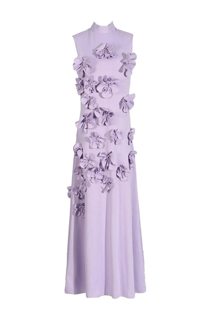 Woman in pink crepe gown with 3D floral appliques