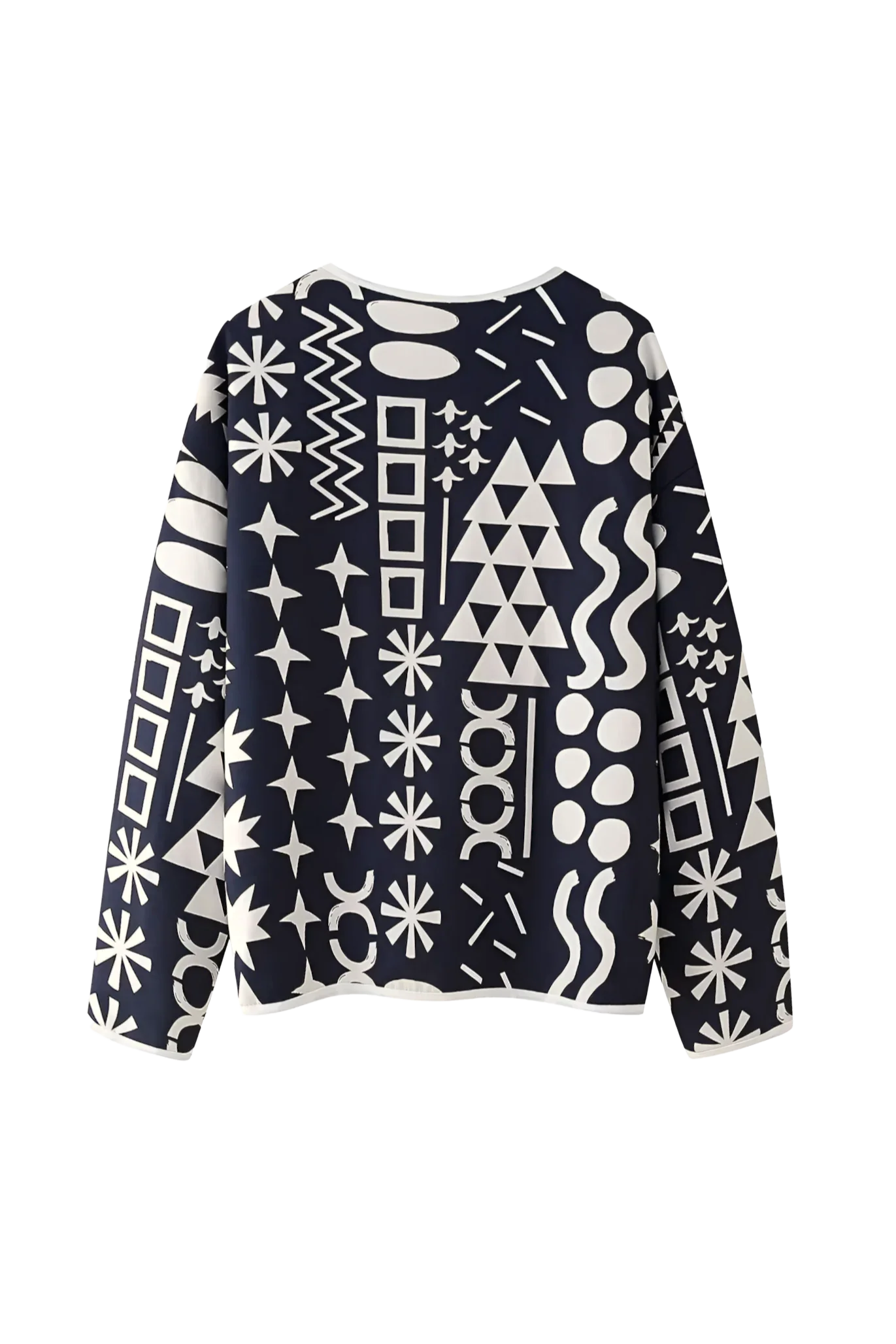 Dark Blue - Woman wearing a navy blue quilted open-front jacket with bold white abstract geometric embroidery, styled with jeans and sandals.