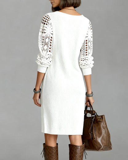 White - Knit ribbed long sleeve midi dress with broderie sleeve details and a v-neckline in solid white.