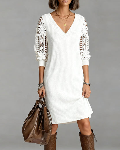White - Knit ribbed long sleeve midi dress with broderie sleeve details and a v-neckline in solid white.