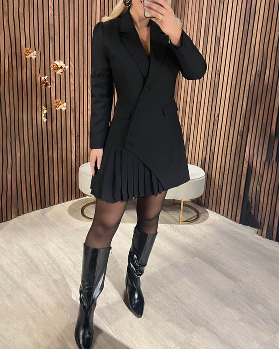 Black - Woman wearing a heavyweight long sleeve blazer mini dress featuring a diagonal button front and an asymmetrical pleated hem