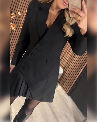 Black - Woman wearing a heavyweight long sleeve blazer mini dress featuring a diagonal button front and an asymmetrical pleated hem