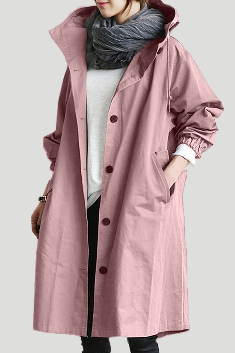 Pink - A model wearing a light grey mid-length hooded coat with a single-breasted button front, styled with a black scarf and black pants against a plain white background.