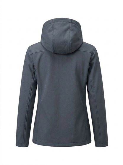Gray - A woman wearing a structured olive green matte technical hooded jacket with a front zip closure, panelled seam detailing, and zippered pockets, paired with beige trousers.