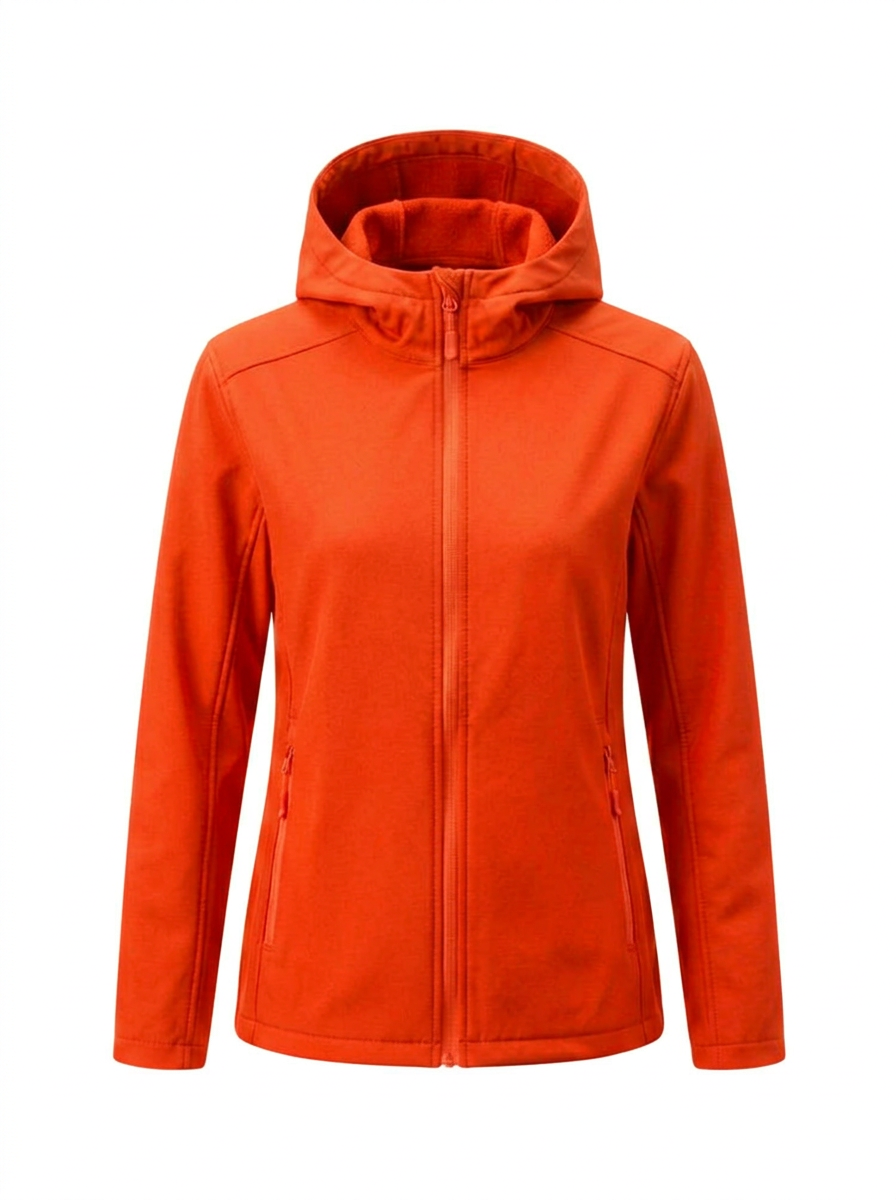 Orange - A woman wearing a structured olive green matte technical hooded jacket with a front zip closure, panelled seam detailing, and zippered pockets, paired with beige trousers.