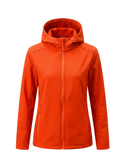 Orange - A woman wearing a structured olive green matte technical hooded jacket with a front zip closure, panelled seam detailing, and zippered pockets, paired with beige trousers.
