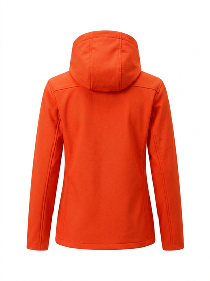 Orange - A woman wearing a structured olive green matte technical hooded jacket with a front zip closure, panelled seam detailing, and zippered pockets, paired with beige trousers.