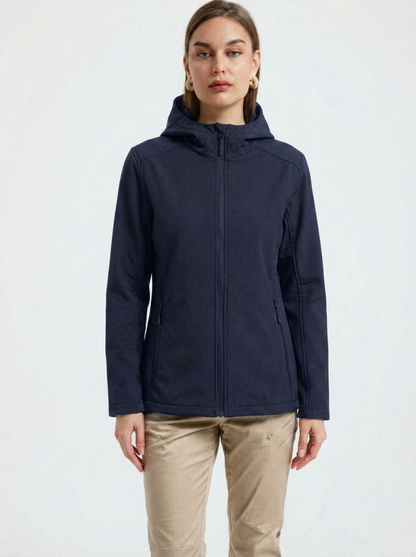 Navy - A woman wearing a structured olive green matte technical hooded jacket with a front zip closure, panelled seam detailing, and zippered pockets, paired with beige trousers.