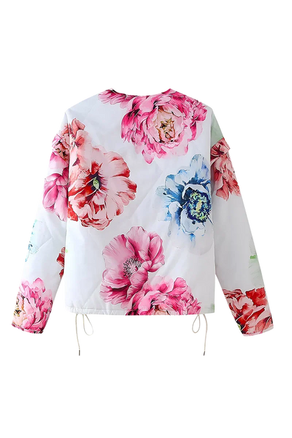 White - Women's oversized, cropped quilted jacket featuring a bold, large-scale floral print on a light background, styled with a snap-button front and drawstring hem.