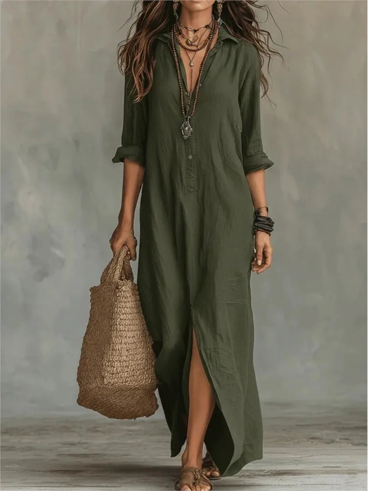 Army Green - A woman wearing a relaxed-fit white linen maxi sundress with a pointed collar, button placket, and front slit, carrying a woven straw bag.