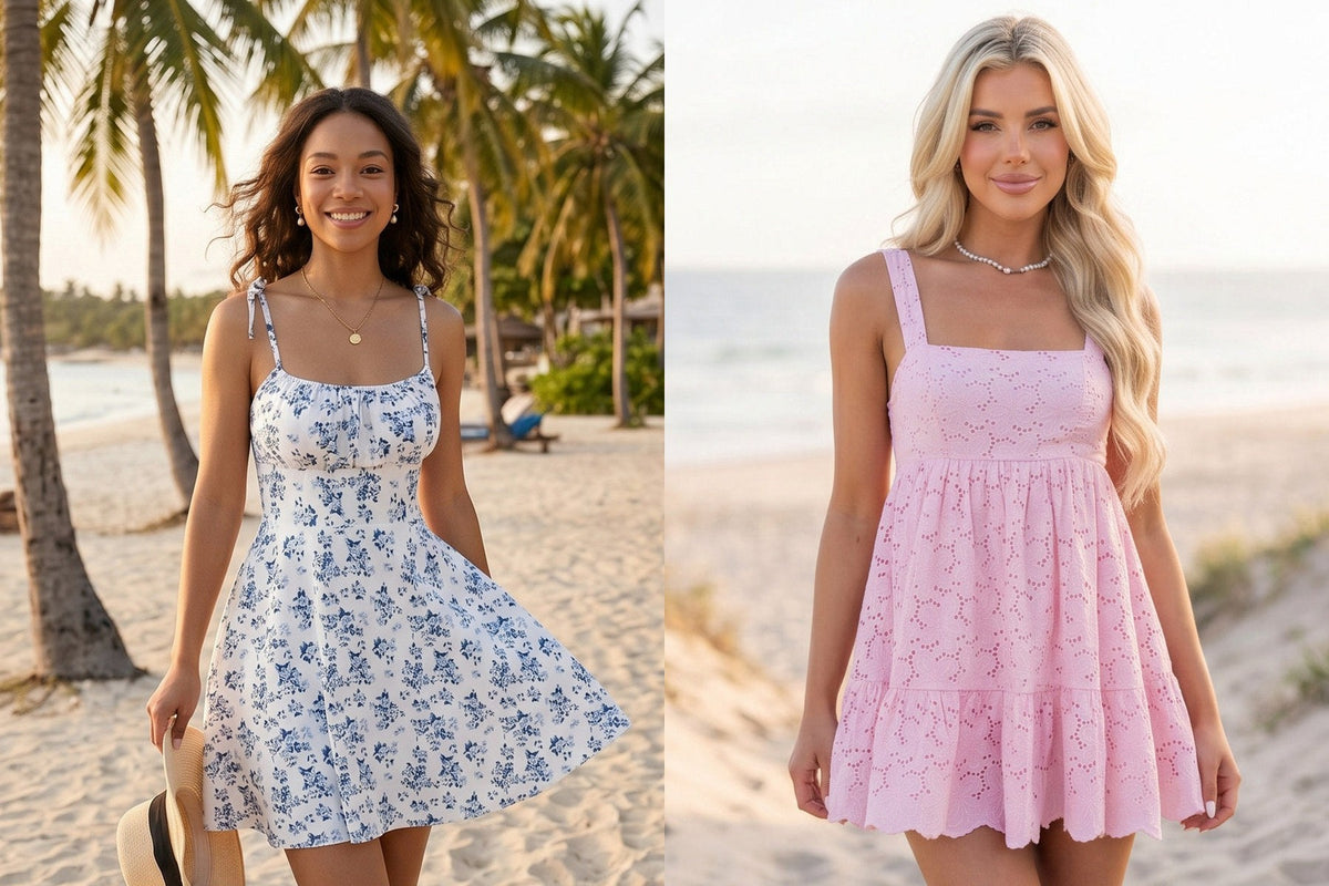 Two women on the beach in mini sundresses, one in blue florals and one in pink eyelet