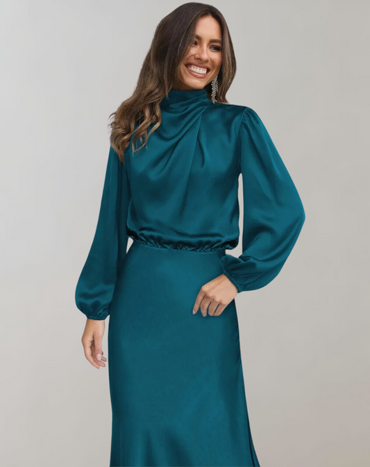 Dark blue - Woman wearing a long sleeve satin midi dress with a high gathered neckline and cinched waist