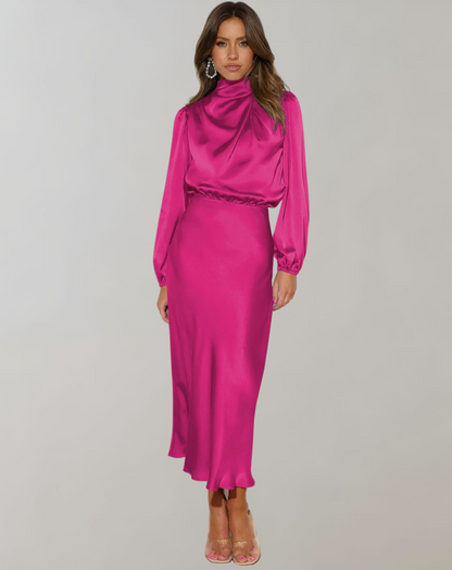 Pink - Woman wearing a long sleeve satin midi dress with a high gathered neckline and cinched waist