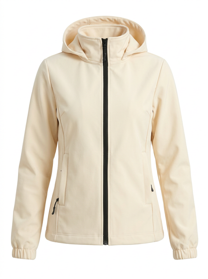 White - A woman wearing a cream-coloured structured hooded jacket with a contrast black front zipper, elasticised cuffs, and side pockets, paired with black pants.