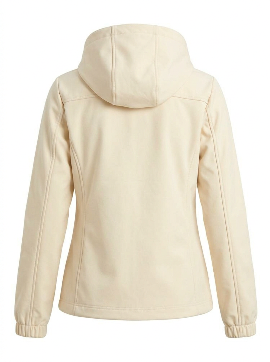 White - A woman wearing a cream-coloured structured hooded jacket with a contrast black front zipper, elasticised cuffs, and side pockets, paired with black pants.