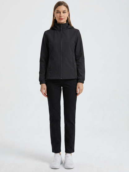 Black - A woman wearing a cream-coloured structured hooded jacket with a contrast black front zipper, elasticised cuffs, and side pockets, paired with black pants.