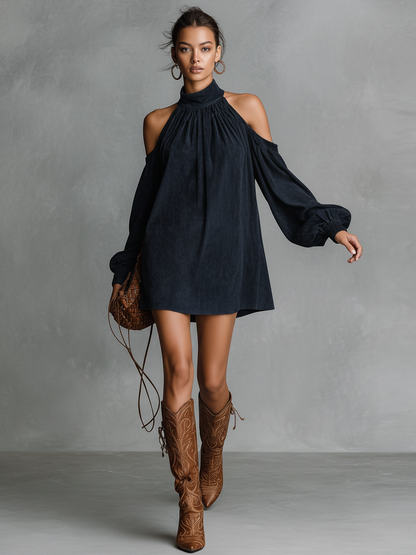 Navy - A model wears a brown suede-look mini shift dress featuring a gathered high neck, cold-shoulder cut-outs, and long balloon sleeves with shirred cuffs, paired with embroidered knee-high boots.