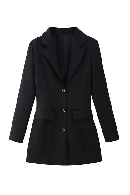 Black - Model standing on stairs wearing a tailored long-sleeve mini blazer dress with front buttons and flap pockets.