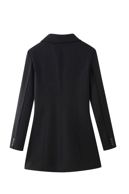 Black - Model standing on stairs wearing a tailored long-sleeve mini blazer dress with front buttons and flap pockets.