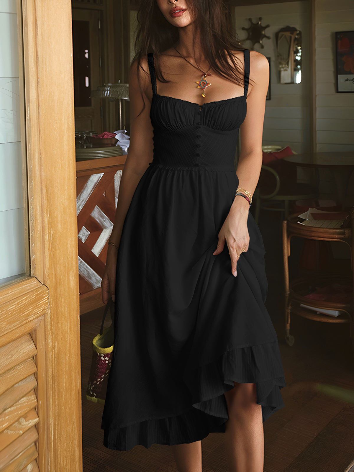Black - Light pink textured midi dress featuring a ruched sweetheart neckline, button-front bodice, spaghetti straps, and a flowing ruffled hem.