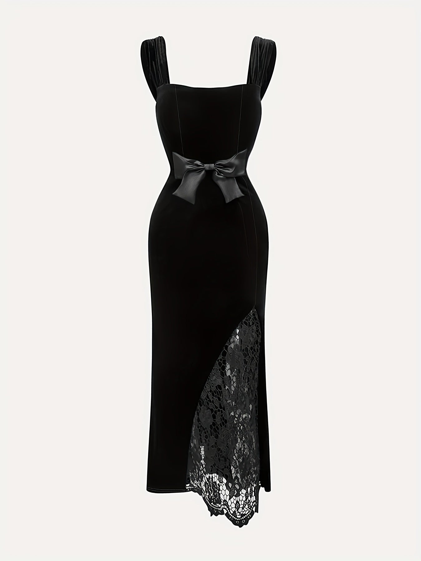 Model walking a runway wearing a long velvet bodycon dress featuring a sweetheart neckline, cap sleeves, a bow at the waist, and a high slit with a lace insert.